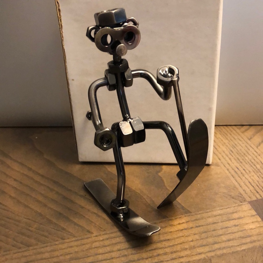 Metal skier sculpture